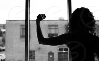 A Strong Woman Looks a Challenge in The Eye and Gives it a Wink